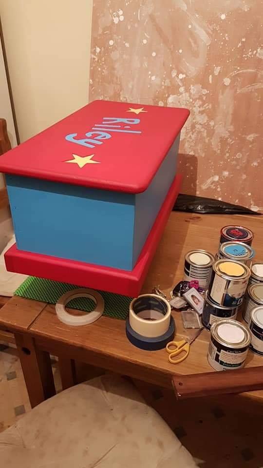 Upcycled toy box with cheap and reusable paint.