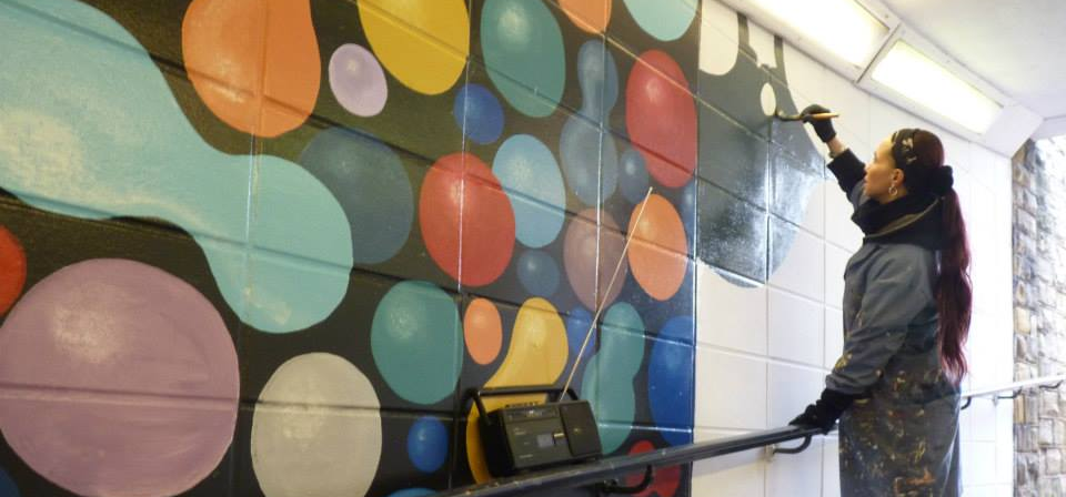 Community wall painted mural using cheap and affordable recycled paint from Community RePaint scheme.