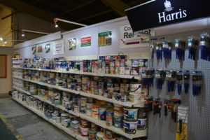 Paint display selling cheap and reusable paint at a Community RePaint Scheme.