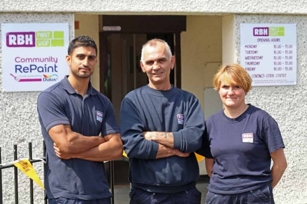 Group photo of staff at Community RePaint scheme.