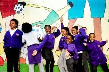Community wall painted mural using cheap and affordable recycled paint from Community RePaint scheme.