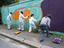 Community wall painted mural using cheap and affordable recycled paint from Community RePaint scheme.