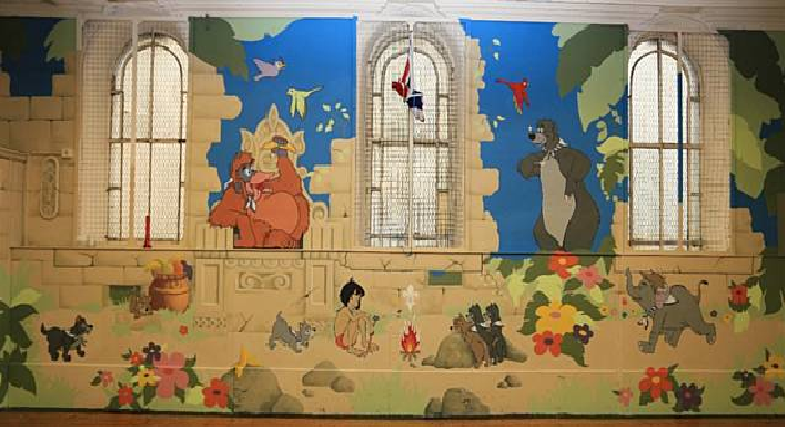 Community wall painted mural using cheap and affordable recycled paint from Community RePaint scheme.