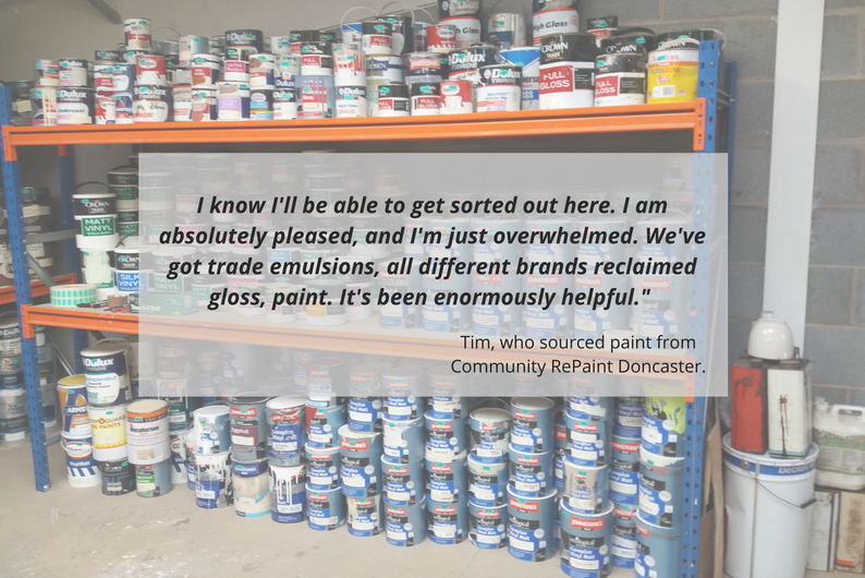 Paint display selling cheap and reusable paint at a Community RePaint Scheme.