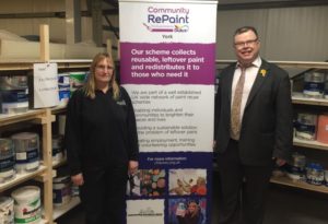 Paint display selling cheap and reusable paint at a Community RePaint Scheme.