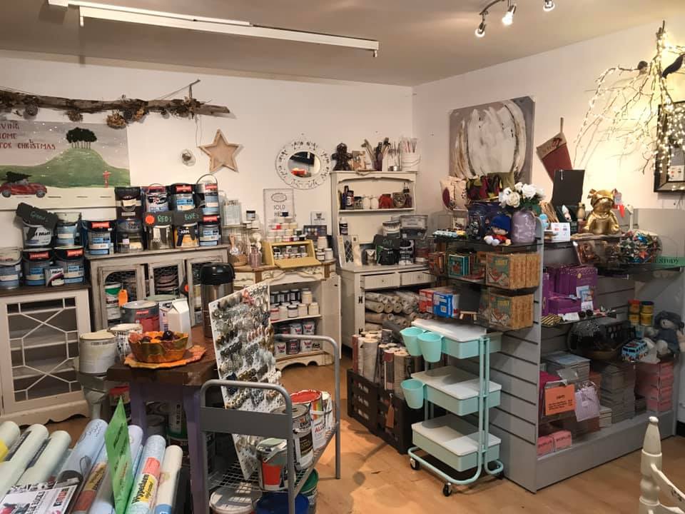Photo of the Community RePaint Cornwall shop that is filled with cheap and recycled paint for sale, craft materials and wallpaper.