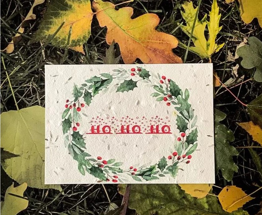 Plantable christmas card that has plant seeds embedded in the paper pulp for a zero waste Christmas.