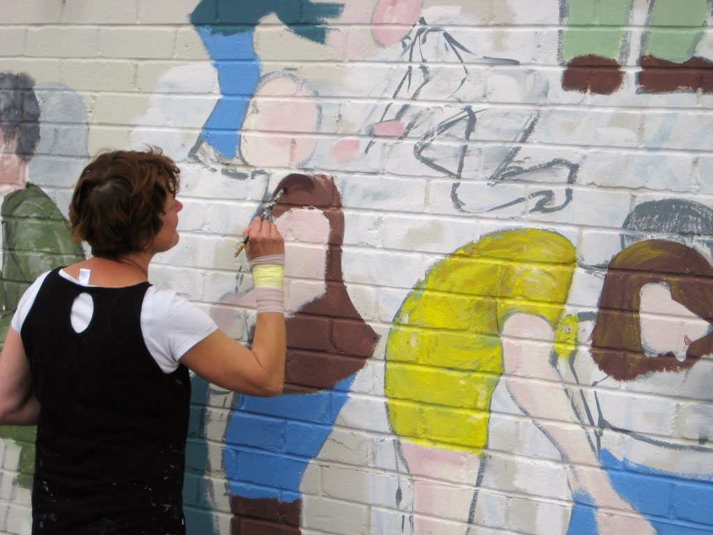 Community wall painted mural using cheap and affordable recycled paint at Community RePaint North Allerdale.